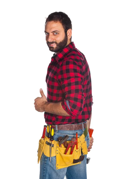 Pracownik w plaid shirt z kciuk w górę — Zdjęcie stockowe