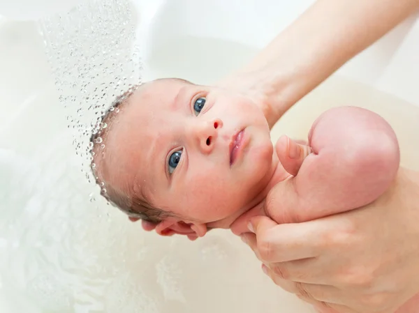 Newborn first bath — Stock Photo, Image