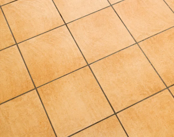 Brown ceramic floor tiles — Stock Photo, Image