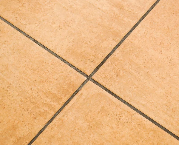 Brown ceramic floor tiles — Stock Photo, Image