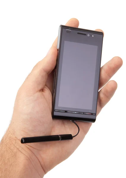 Рука держит чистый мобильный смартфон — стоковое фото