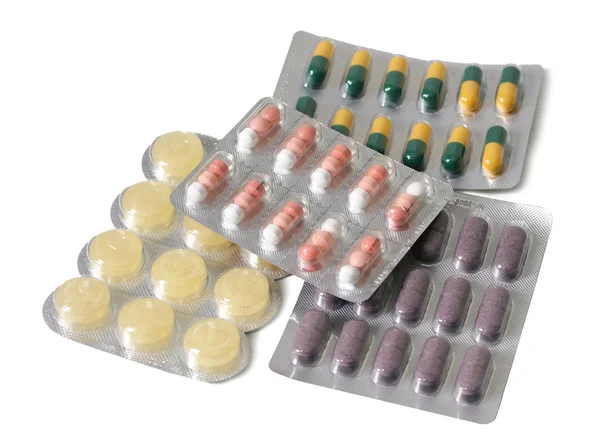 Pillole diverse sul piatto — Foto Stock