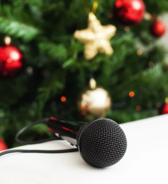 Black microphone with christmas tree — Stock Photo, Image