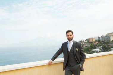 Young Italian groom before marriage in Sorrento peninsula. clipart