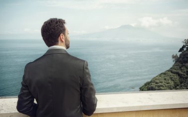 Young Italian groom before marriage in Sorrento peninsula. clipart