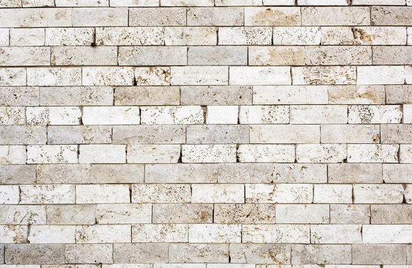 Wall made with bricks of marble. — Stock Photo, Image