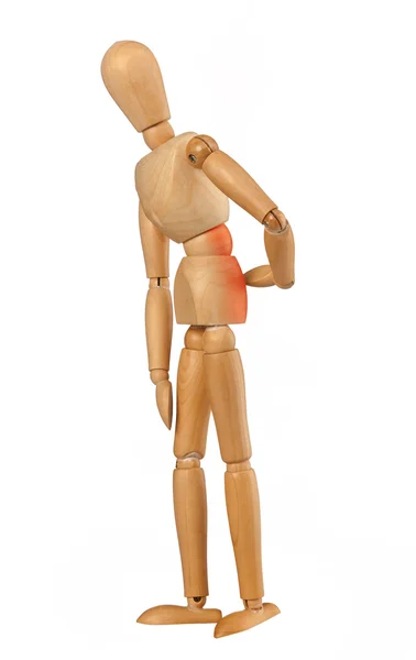 Wooden dummy with back pain — Stock Photo, Image