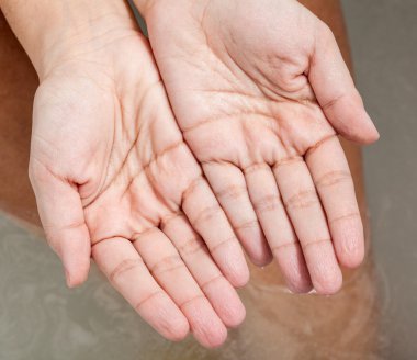 Wrinkled skin of the hands clipart