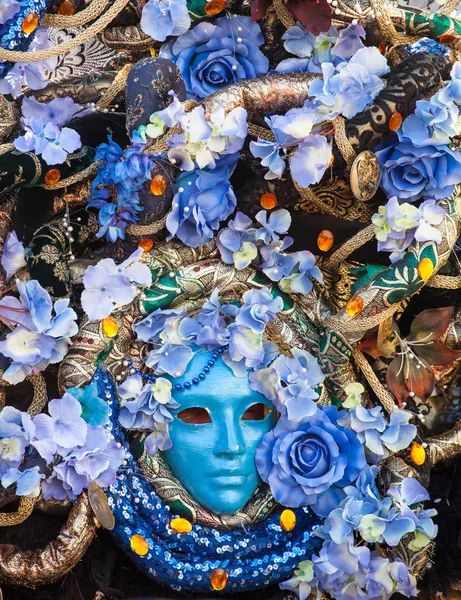 Bllue mask with floral decorations exhibited during the Carnival — Stock Photo, Image