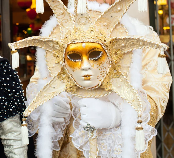 Scepter with Venetian carnival mask shaped the sun. — Stock Photo, Image