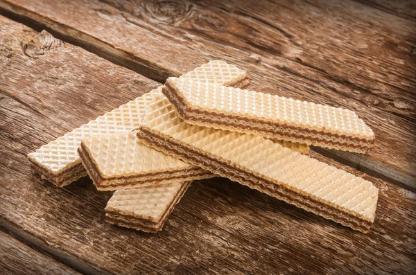 Wafers on wooden table. — Stock Photo, Image