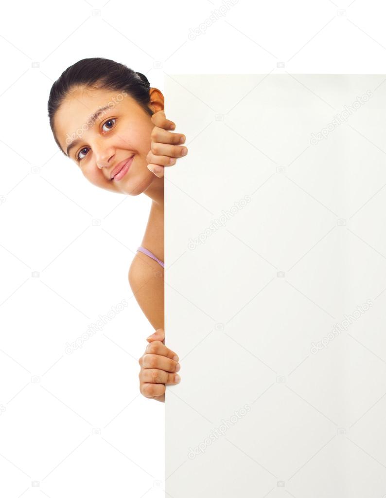 Teen girl holding blank board