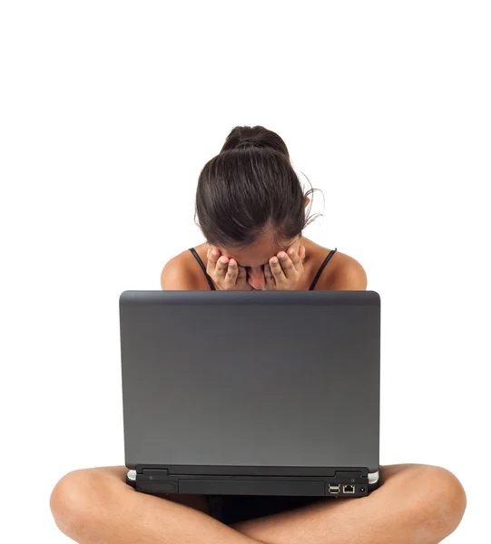 Teenage girl crying in front of the laptop. — Stock Photo, Image