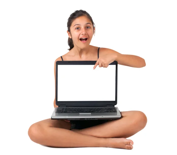 Teenager pointing at the blank screen of the laptop. — Stock Photo, Image