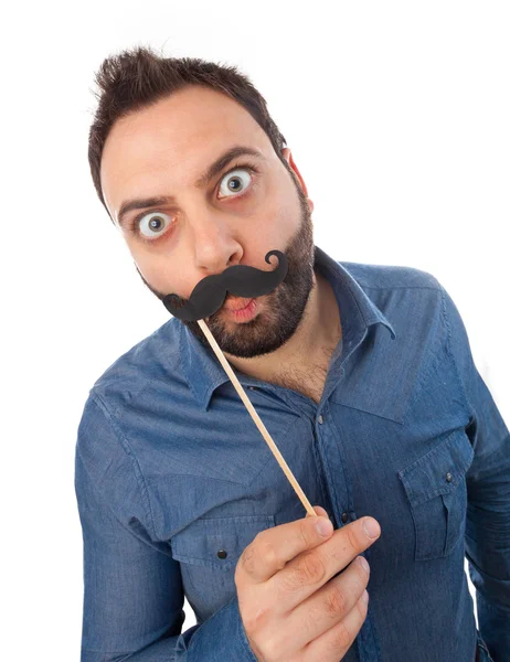 Young man with photo booth mustache — Stock Photo, Image