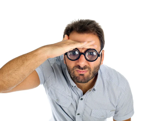 Hombre con expresión sorprendida y gafas gruesas — Foto de Stock