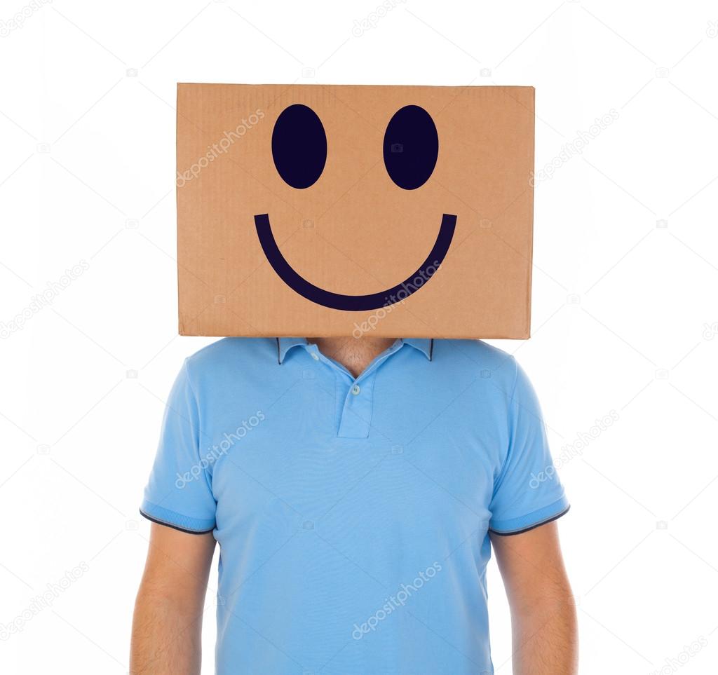 Man standing with a cardboard box on his head with smiley face