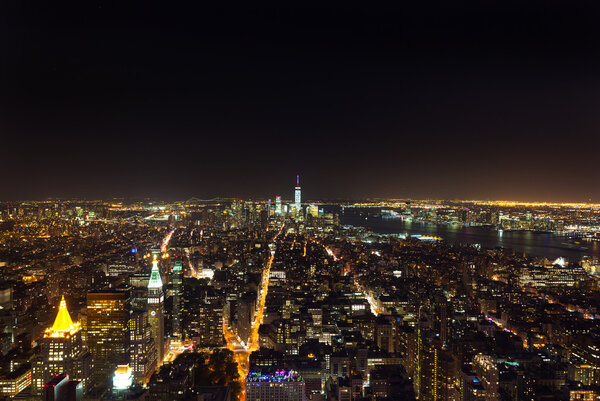 Aerial night view of Manhattan skyline, New York