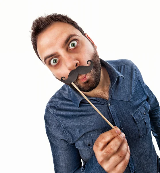 Jovem com bigode em forma de cabine de fotos — Fotografia de Stock