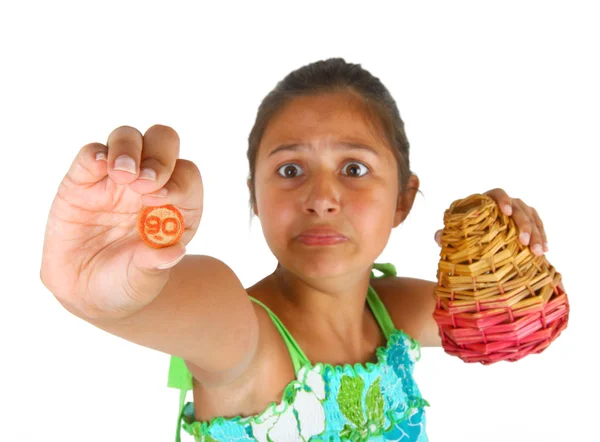 Niña con cesta de números para bingo —  Fotos de Stock