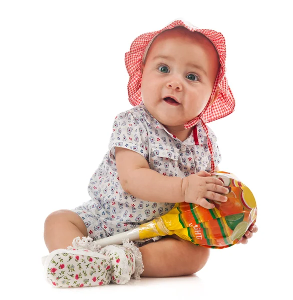 Χαριτωμένο μικρό θηλυκό παιδί με γλειφιτζούρι — Φωτογραφία Αρχείου