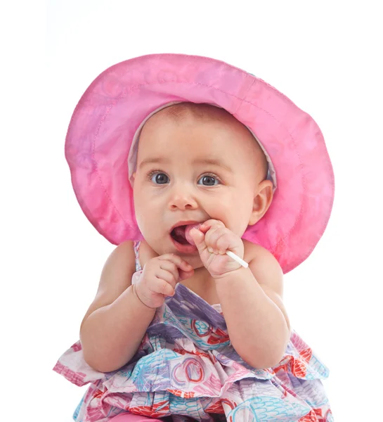 Χαριτωμένο μικρό θηλυκό παιδί με γλειφιτζούρι — Φωτογραφία Αρχείου