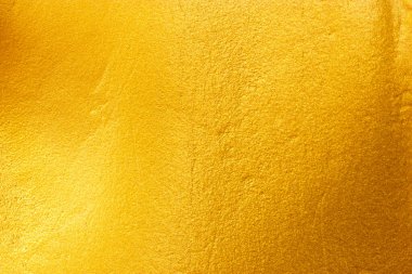 Altın metal fırçalanmış arka plan veya fırçalanmış çelik dokusu