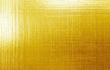Altın metal fırçalanmış arka plan veya fırçalanmış çelik dokusu
