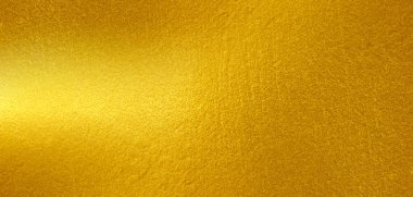 Altın metal fırçalanmış arka plan veya fırçalanmış çelik dokusu