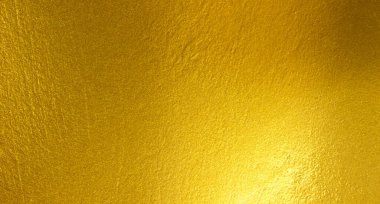 Altın metal fırçalanmış arka plan veya fırçalanmış çelik dokusu