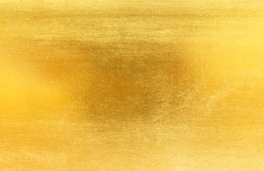 Altın metal fırçalanmış arka plan veya fırçalanmış çelik dokusu