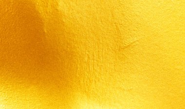 Altın metal fırçalanmış arka plan veya fırçalanmış çelik dokusu