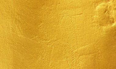 Altın metal fırçalanmış arka plan veya fırçalanmış çelik dokusu