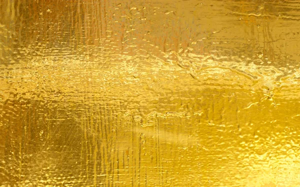 Gold painted wall drifting water dripping paint