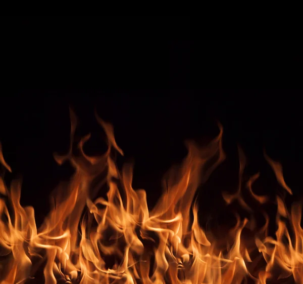 Flames on a black background. — Stock Photo, Image