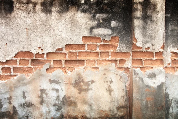 Viejo sucio pared de ladrillo negro — Foto de Stock