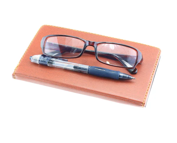 Brown notebook with pen — Stock Photo, Image