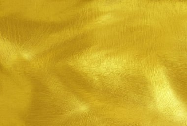 Parlak sarı yaprak altın folyo dokusu arka plan