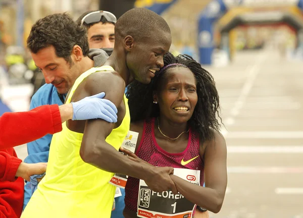 Florence Kiplagat with Abel Kirui after to break half Marathon world record — Stock Photo, Image