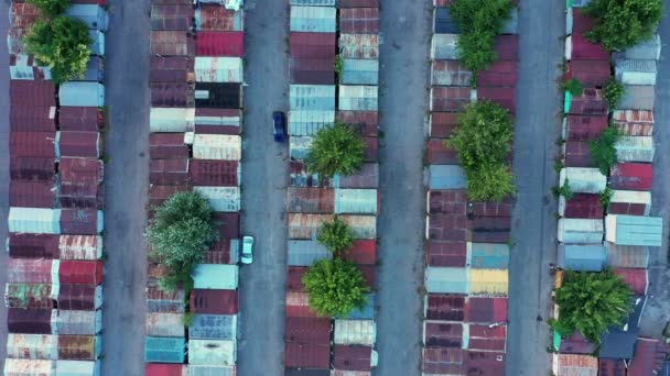 Multicolored containers in the industrial zone of the city - aerial panorama view — Stock Video