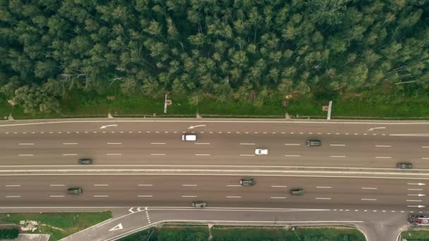 Traffic on the suburban six-lane highway - top view overhead shot. — 비디오