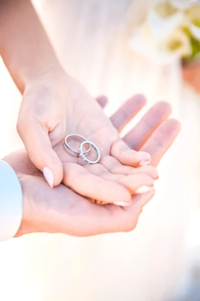 Wedding rings on palm