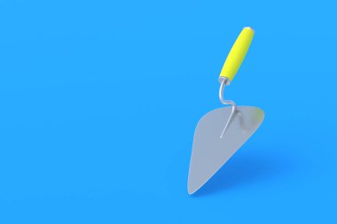 Mavi arka planda sarı saplı bir metal mala. Çimento için spatula, sıva. Binaların, evlerin inşaatı. Profesyonel iş aleti. Uzayı kopyala 3d hazırlayıcı