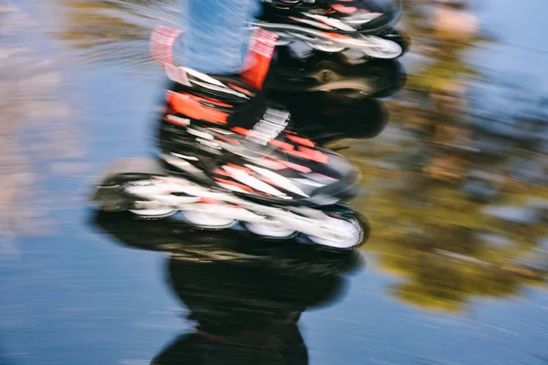 A blurry picture. Movement. Videos. Ride in puddles. A blurry photo in motion.