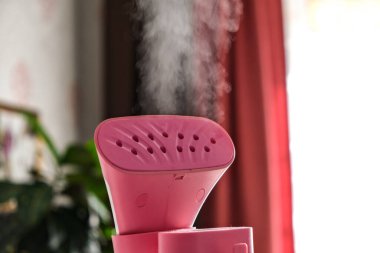 Elbiseli gardırop. Buhar giysileri. Temizlik elbiseleri. Buhar.