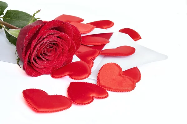 Red rose with Valentines and red hearts on a white background — Stock Photo, Image