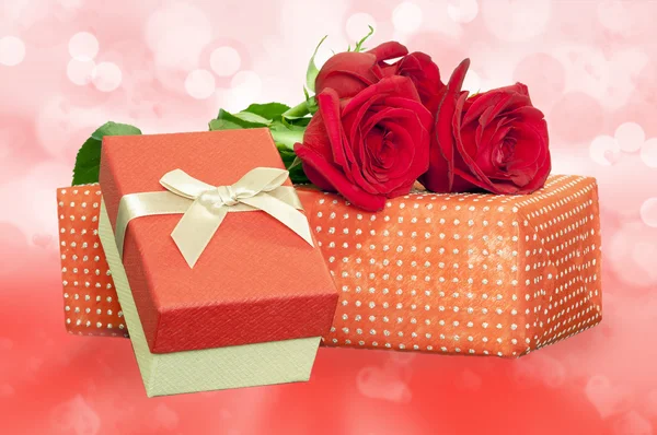 Gifts and flowers for holiday — Stock Photo, Image