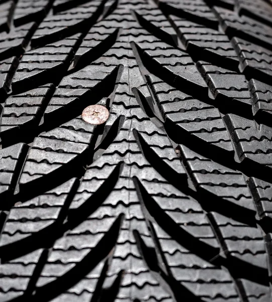 Nail in tyre — Stock Photo, Image