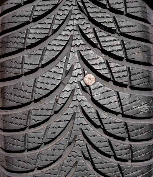 Nail in tyre — Stock Photo, Image