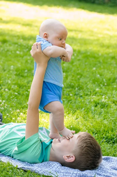 Two boys in garden — Stock Photo, Image